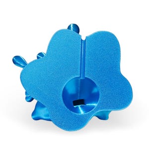 May include: A bright blue 3D printed object shaped like a stylized butterfly with a hole in the center. The object is made of a smooth, textured material.