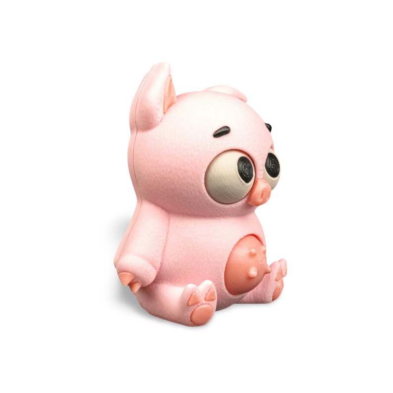 May include: A pink figurine of a pig with large, expressive eyes and a light pink belly. The pig is sitting with its legs outstretched and its arms at its sides. The figurine has a cartoonish design.