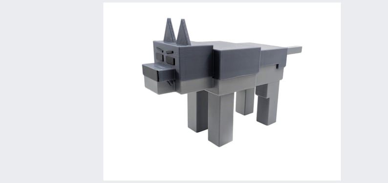 May include: A grey, blocky dog sculpture with a geometric design. The dog has a rectangular body, square legs, and a head with pointed ears. The sculpture is made of a solid material and stands on a white background.