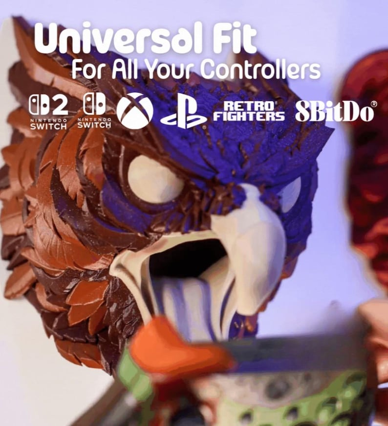 May include: A detailed, multi-colored owl-shaped controller holder. The text "Universal Fit For All Your Controllers" is displayed above the owl. Logos for Nintendo Switch, Xbox, Playstation, Retro Fighters, and 8BitDo are also visible.