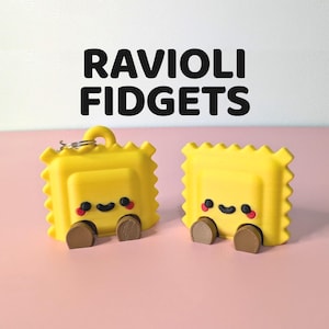 ラビオリフィジェットトイ - かわいいパスタデスクトイ - ストレス解消フィジェットキーチェーン - 大人と子供へのかわいいグルメギフト - 愛らしいパスタパル
