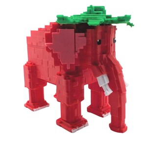 May include: A red, pixelated elephant figurine with green leafy details on its head and white tusks. The toy is made of block-like shapes, giving it a unique, geometric appearance. The elephant stands on four blocky legs.