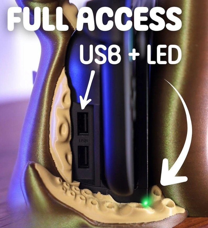 May include: A close-up of a device with the words "FULL ACCESS USB8 + LED" in white. The device has a USB port and a green LED light. The device is tan and gold in color.