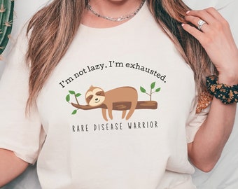 Cute Sloth T-Shirt for Rare Disease Awareness; Exhausted Not Lazy Sloth Graphic Tee; Cute Spoonie Shirt for Rare Disease Day 2024; Nap Tee