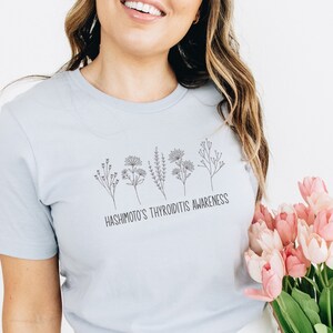 Pretty Hashimoto’s T-Shirt; Hashimoto’s Thyroiditis Shirt; Hashimoto’s Disease Floral Graphic Tee; Thyroid Diseases Apparel