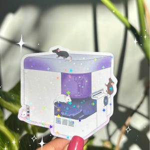 May include: A sticker depicting a printer with cartoon mice. The printer is white and purple, with a cylindrical purple element. Several mice are positioned around the printer, creating a fun and imaginative scene.