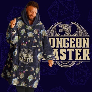 May include: A blue hooded blanket with a Dungeons and Dragons theme. The blanket is covered in a pattern of dice, dragons, and other fantasy elements. The text "Dungeon Master" is printed on the front pocket.