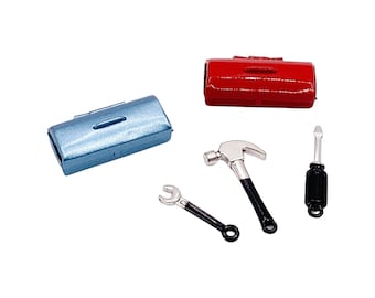May include: A set of miniature tools including a hammer, screwdriver, and wrench. The tools are silver with black handles. There are also two small toolboxes, one red and one blue.