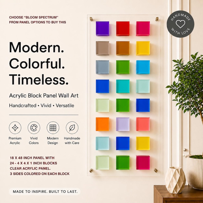 May include: A modern acrylic block panel wall art piece. The clear panel holds 24 multi-coloured blocks, each measuring 10 x 10 x 2.5 cm. The blocks are arranged in a grid and feature a variety of colours, including green, orange, and pink.