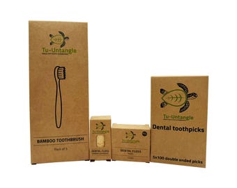 Puede incluir: Productos de higiene dental ecológicos, que incluyen cepillos de dientes de bambú, hilo dental y palillos. El embalaje es de cartón marrón y presenta un logotipo de tortuga y el texto "Tu-Untangle".