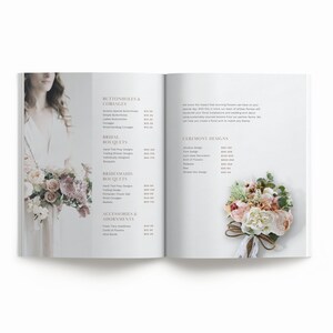 May include: Open book with a price list for wedding floral arrangements. The book is open to a page with a list of prices for boutonnieres, corsages, bridal bouquets, bridesmaids bouquets, and ceremony designs. The page also includes a photo of a pink and white floral bouquet.