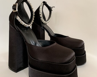 black platform pumps
