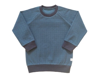 Sweater in petrol color