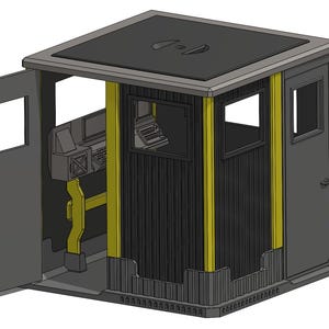 May include: A gray and black booth-like structure with yellow support beams. The booth has a flat roof, two windows, and two doors. Inside, there are computer monitors, a keyboard, and a typewriter. The booth is designed with a detailed, architectural style.