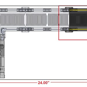 May include: Top-down view of a modular structure, 24 inches long and 12 inches high. The design features a combination of white and black components with yellow accents. The structure has a series of parallel lines and a rectangular shape.