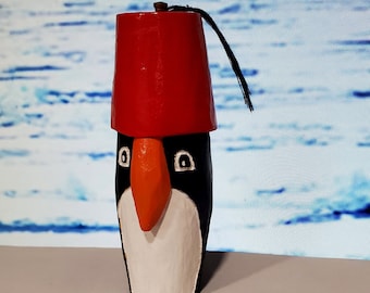 Hand carved Penguin in a Fez