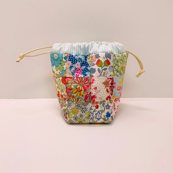 Drawstring Bag, small handmade Liberty London fabric patchwork pouch, padded & lined, use for trinkets dice and other small items, by Tikki