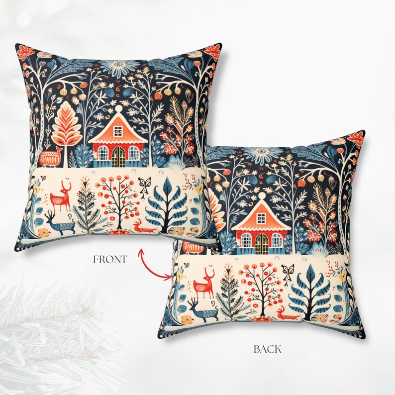 May include: Cushion with a folk art forest design. The pillow displays a red-roofed cottage, deer, and stylized trees on a dark blue backdrop. The front and back designs are shown, with the words "FRONT" and "BACK" visible.