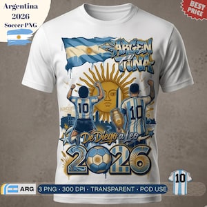 May include: A white short-sleeve t-shirt featuring a graphic print of two football players wearing number 10 jerseys, the Argentine flag, a sun emblem, a trophy, and the text "ARGENTINA", "De Diego a Leo", and "2026" in blue and gold tones.