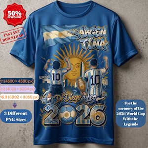 May include: A blue t-shirt featuring a graphic of two football players wearing number 10 jerseys, the Argentina flag, a golden sun, a trophy, and a football. Text includes "ARGENTINA", "De Diego a Leo", "2026", "50% DISCOUNT", "INSTANT DOWNLOAD", and "For the memory of the 2026 World Cup With the Legends".
