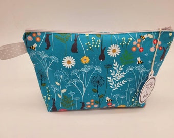 Wild flower zipped bag,accessories bag, wash bag, medicine bag. Water resistant. 2 different designed fabrics. Other patterns available