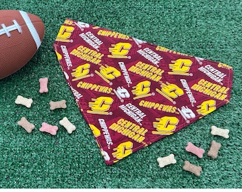 May include: A red and yellow dog bandana with the text "Central Michigan" and "Chippewas" repeated throughout the design.