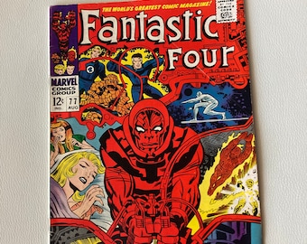 May include: A comic book cover featuring the Fantastic Four, a group of superheroes. The cover is red, yellow, and blue with a large image of the Thing, a superhero with orange skin, in the center. The cover text reads "Fantastic Four" and "Shall Earth Endure?"