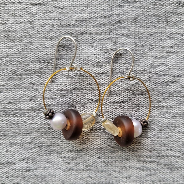 Seaglass -- handmade in USA earrings on thin gold wire hoop.  Lightweight, preowned, and in great condition.