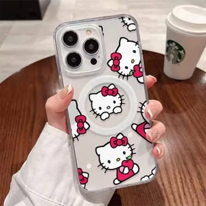 Hello Kitty - iPhone 16 Pro Max, Modell 2024 Handyhülle. Niedliche Kawaii Cartoon Kitty, Sanrio und Freunde. Anime. Hello Kitty Rote Schleifen & Äpfel