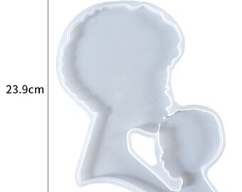 Large silicone mold of a woman/mother kissing a child's head design, perfect for epoxy resin, concrete, soaps, candles, or other casting projects.