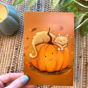 Cartão postal de gato e abóbora
