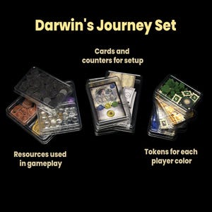 May include: A board game set titled "Darwin's Journey Set" with various components. The set includes cards, counters, resources, and tokens in clear plastic containers. The text on the image reads "Cards and counters for setup", "Resources used in gameplay", and "Tokens for each player color."