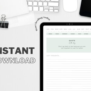 May include: Digital planner on a tablet with a calendar, quote, and space for notes. The text "INSTANT DOWNLOAD" is displayed with the words "Start healing today". A cup of coffee, a phone, and a keyboard are also visible.