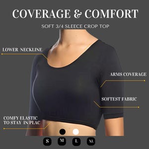 May include: Black 3/4 sleeve crop top with a lower neckline and a comfy elastic band. The top is made of a soft fabric and provides arm coverage. The text "COVERAGE & COMFORT" and "SOFT 3/4 SLEECE CROP TOP" is displayed at the top of the image. The sizes S, M, L, and XL are displayed at the bottom of the image.