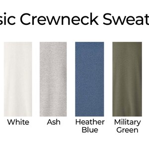 May include: Classic crewneck sweatshirt in eight colors: Heather Maroon, Sand, White, Ash, Heather Blue, Military Green, Mint, and Black.