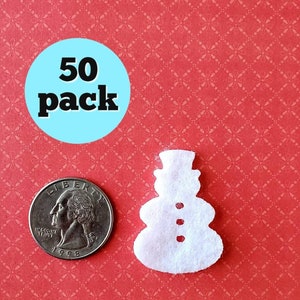 May include: A pack of 50 white felt snowman shapes. The snowman is about the size of a US quarter.