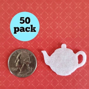 May include: 50 pack of white felt teapots, each about the size of a US quarter.