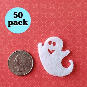 May include: A pack of 50 white felt ghost cutouts. The ghosts are about the size of a US quarter.