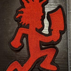 May include: A set of three ceramic mugs with a speckled, matte finish in cream, light grey, and dark grey. Each mug has a simple, minimalist design, suitable for coffee or tea.