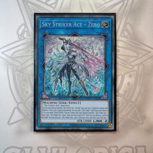 May include: A blue trading card with the text "SKY STRIKER ACE - ZERO" and a detailed illustration of a character with a sword. The card has a black border and includes game text and stats. The card is a "1st Edition" card.