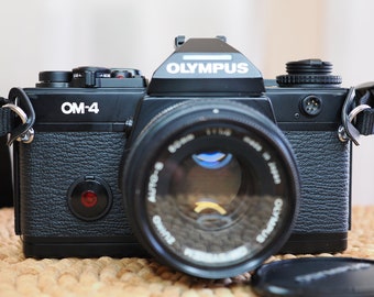Olympus OM-4 analog 35mm film camera: a spot-metering masterpiece! Cleaned, tested and guaranteed