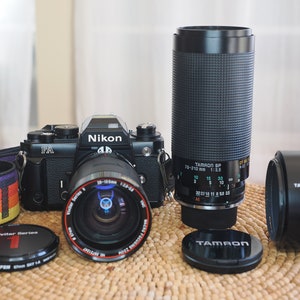 Nikon FA analog film camera in excellent condition! Cleaned, calibrated and working perfectly, with 28-105mm and  70-210mm lenses