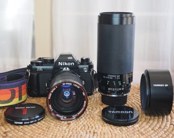 Nikon FA analog film camera in excellent condition! Cleaned, calibrated and working perfectly, with 28-105mm and  70-210mm lenses