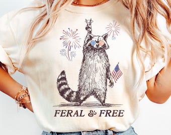 Feral But Free Fireworks Shirt, Summer Raccoon Shirt, 4th Of July Shirt, Father's day Gift, USA Shirt, Funny Raccoon Shirt, Comfort Color
