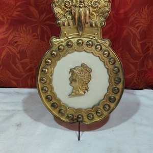 old pendulum for comtoise movement decorated with a female bust (SG10)