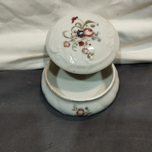 Old white porcelain candy box and floral decoration - sugar bowl