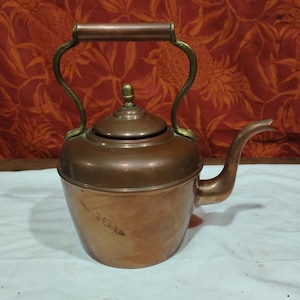 old copper and brass kettle