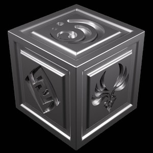 May include: A silver metal cube with different symbols on each side. The symbols include a stylized bird, a geometric pattern, and a stylized letter.