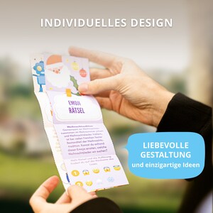Hand hält ein geöffnetes Los der AMARI Kinder-Losbox, zeigt individuelles Design und kreative Ideen – fördernd und unterhaltsam.