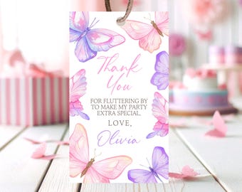 May include: Pink and purple butterfly thank you tags with the text "Thank You" and "For fluttering by to make my party extra special, Love, Olivia".
